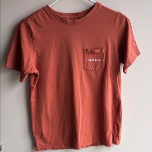 Ivory Ella Junior’s Short Sleeve Tee in Rust.  Minor cracking in design on the b